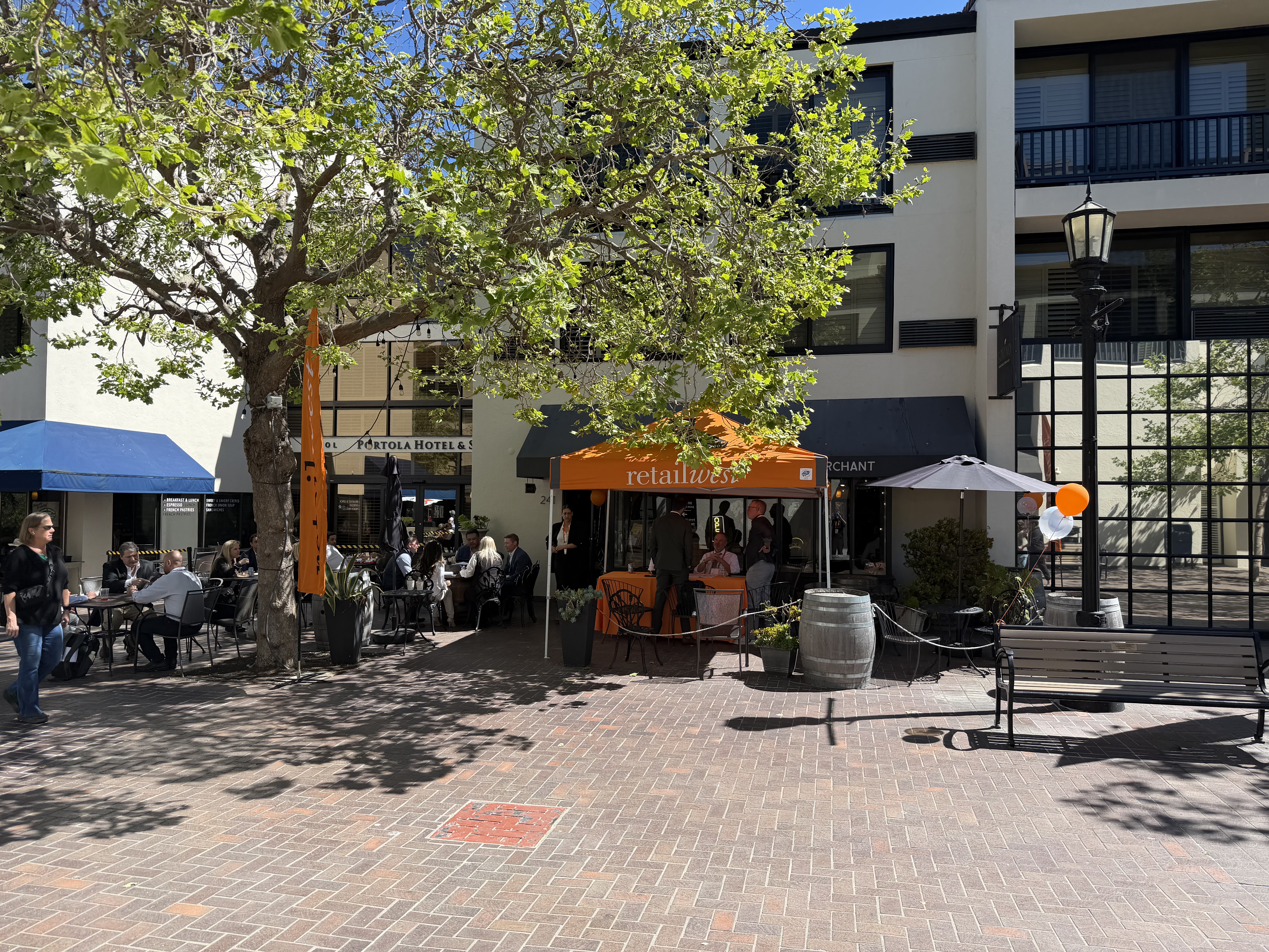An event at Sovino, featuring a booth in front of the bar